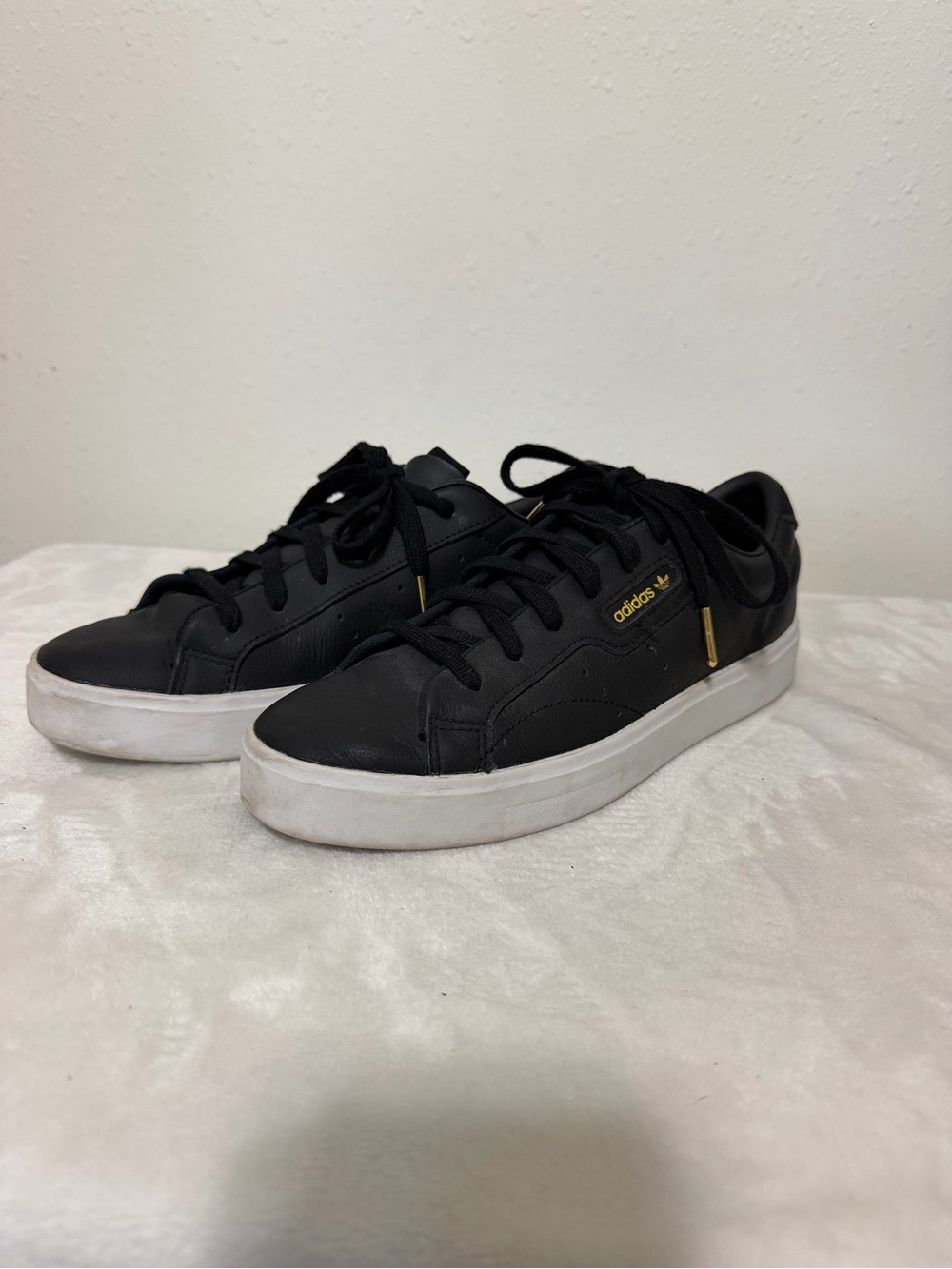 adidas Black Leather Sneakers with White Sole and Gold Details
